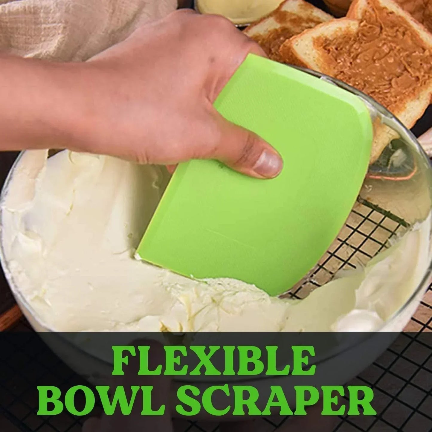 Flexible green bowl scraper mixing batter in glass bowl, kitchen tool for baking and cooking