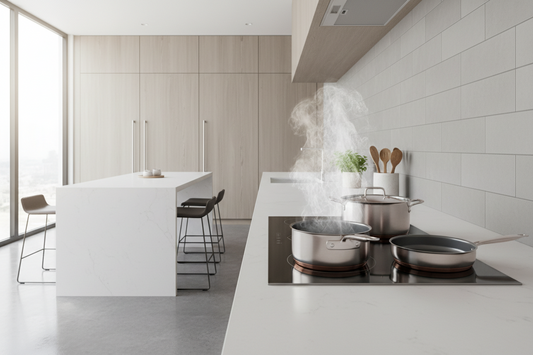 Modern induction cooktop with compatible cookware in a bright clean kitchen