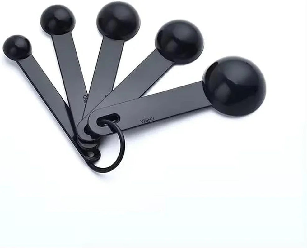 Black measuring spoons set for kitchen cooking and baking tools