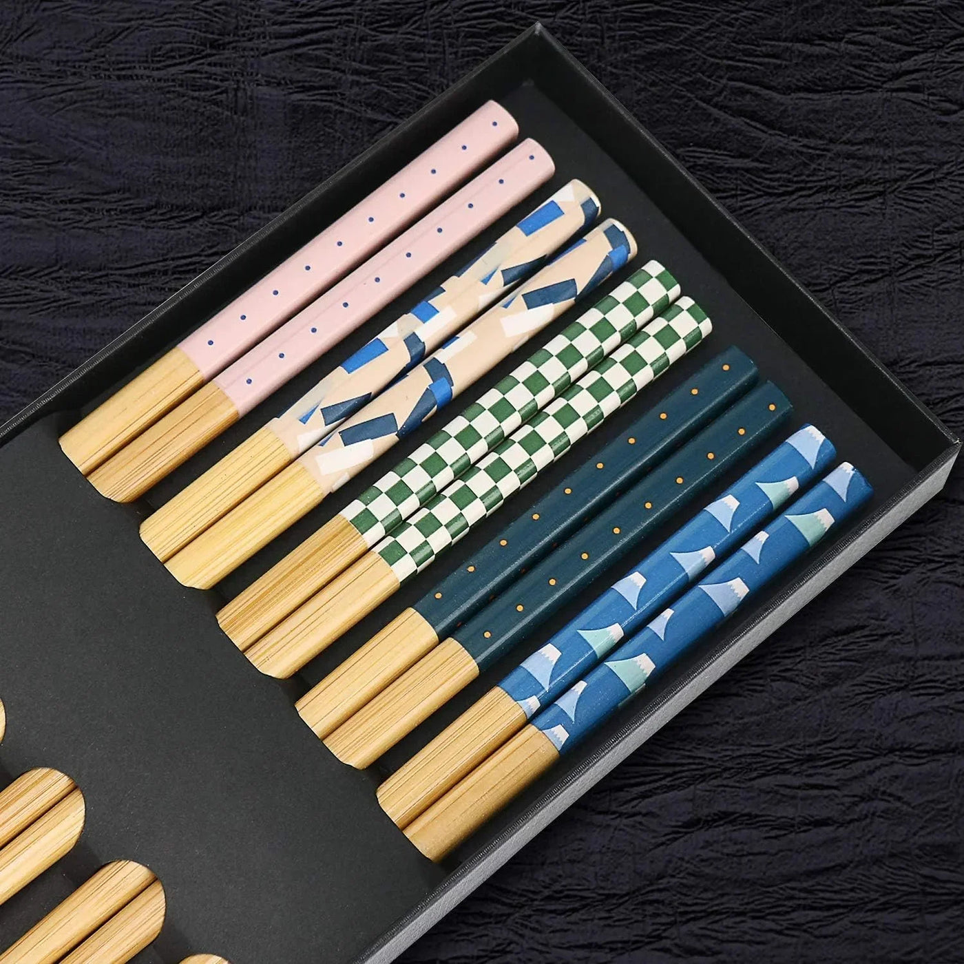 Colorful patterned chopsticks with bamboo tips in black gift box, perfect for kitchen dining sets