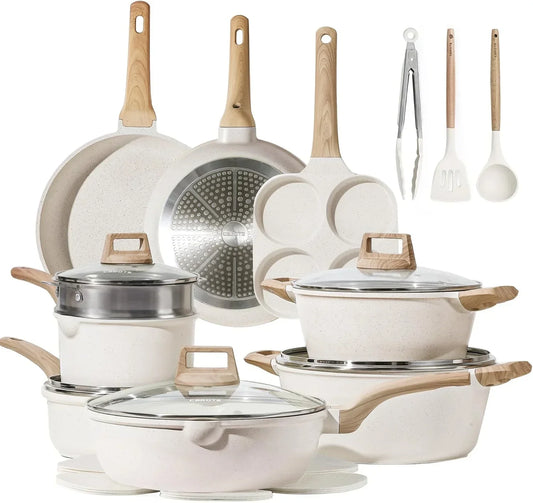Nonstick white cookware set with wooden handles, pots, pans, steam insert, and kitchen utensils