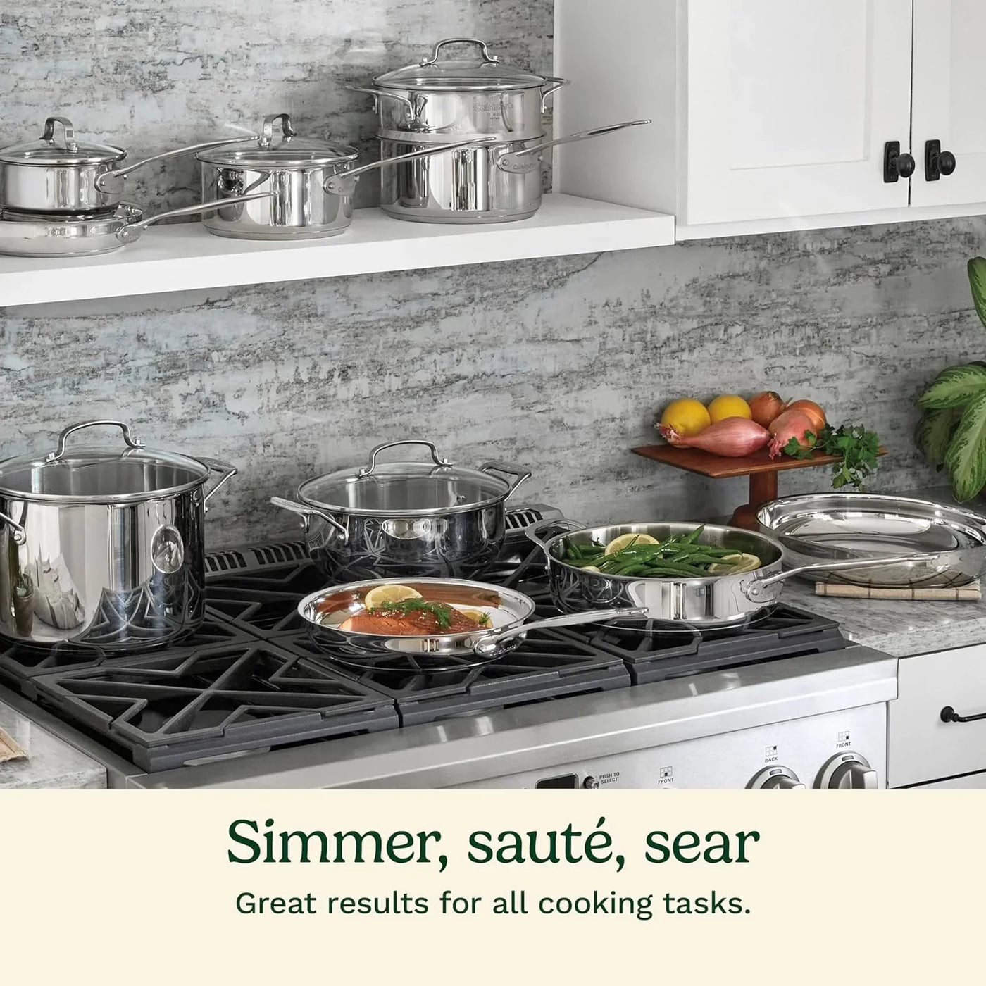 Stainless steel cookware set on gas stove, simmering salmon and green beans, perfect for sautéing and searing.