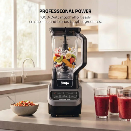 Ninja blender with 1000W motor blending fruits and ice for smoothies in a modern kitchen