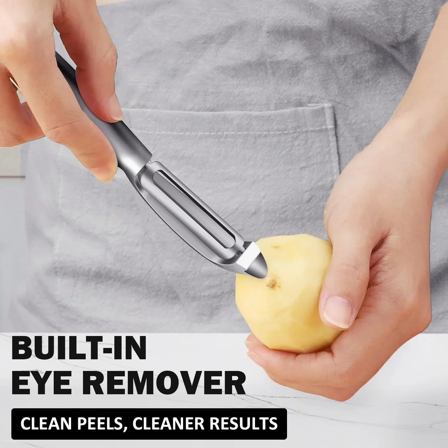 Peeling potato with built-in eye remover peeler for clean, efficient kitchen prep