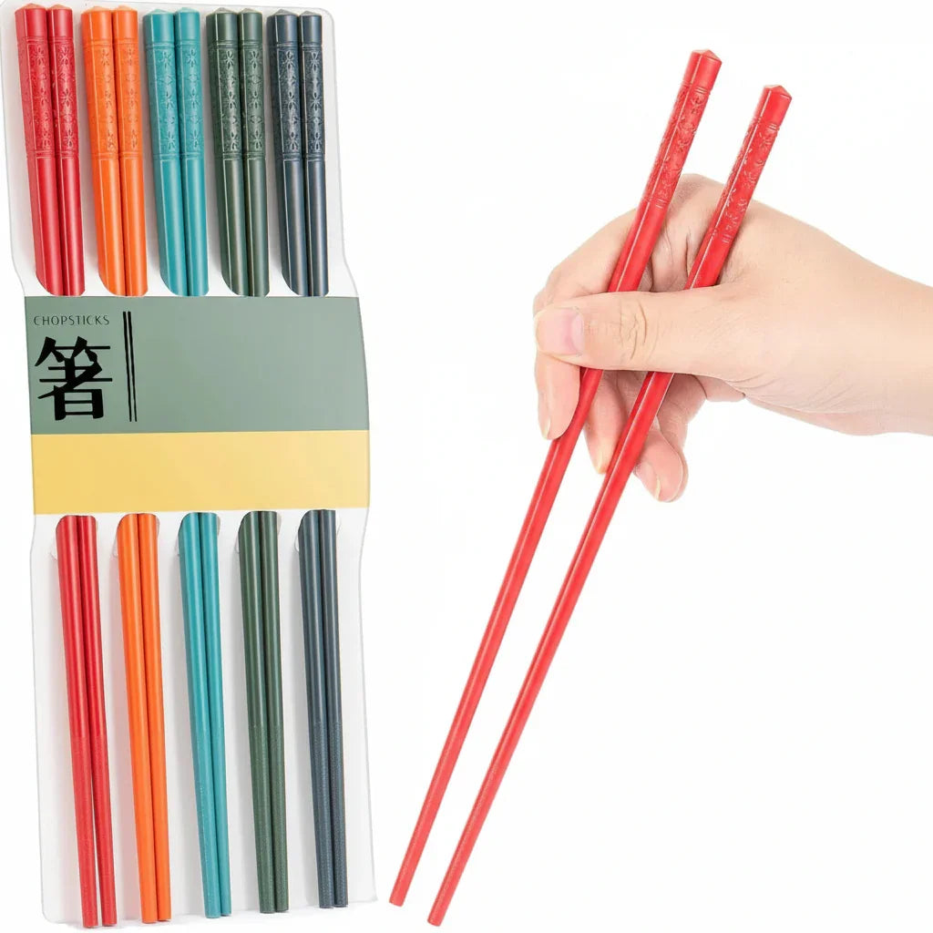 Colorful chopsticks set with red pair in hand, ideal for kitchen dining and serving