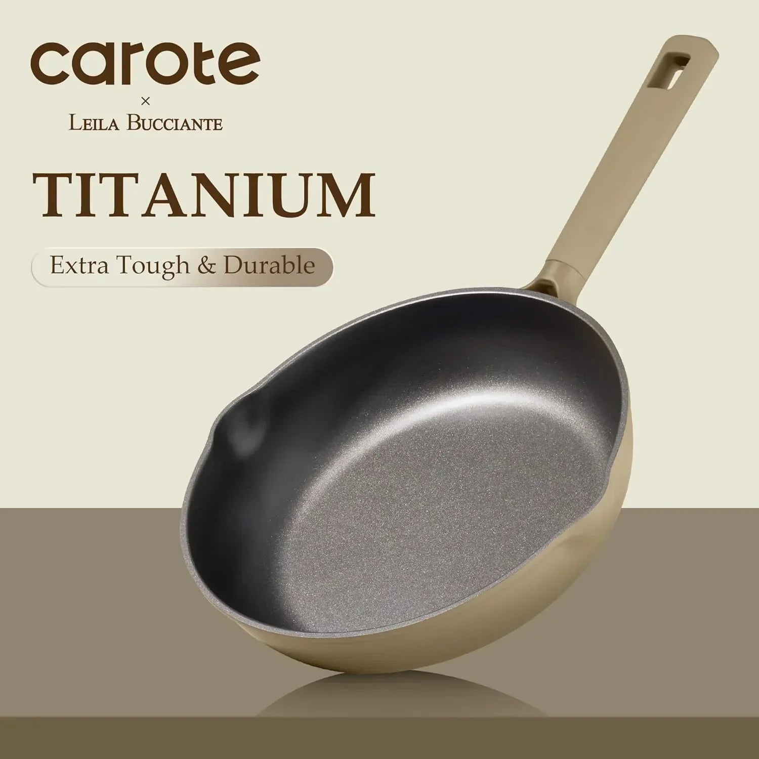 Titanium nonstick frying pan with beige handle, labeled extra tough and durable.