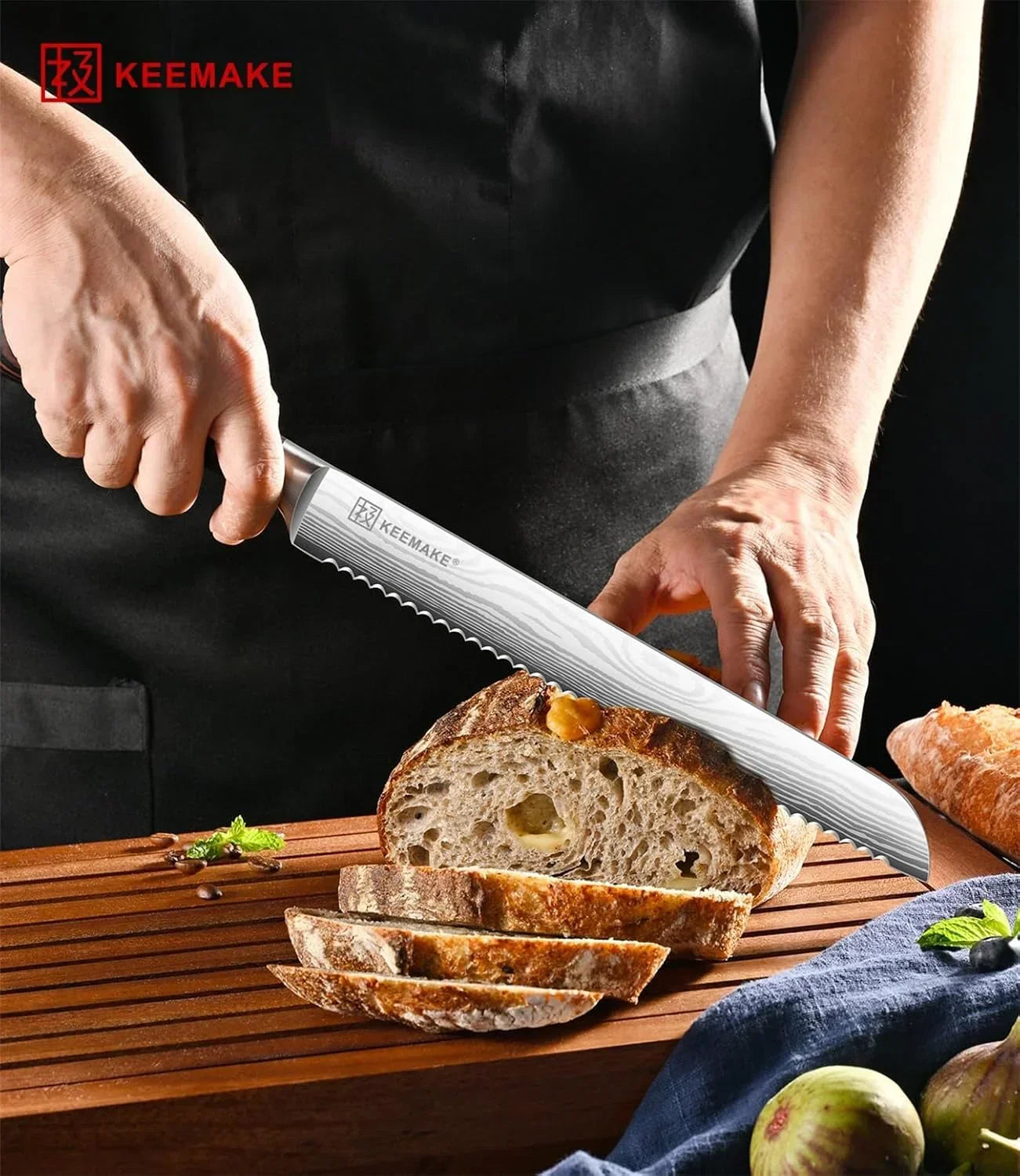 Slicing artisan bread with a serrated KEEMAKE knife on a wooden cutting board