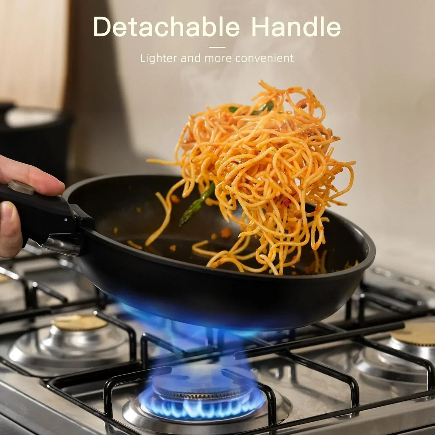 Nonstick frying pan with detachable handle cooking pasta on a gas stove in kitchen