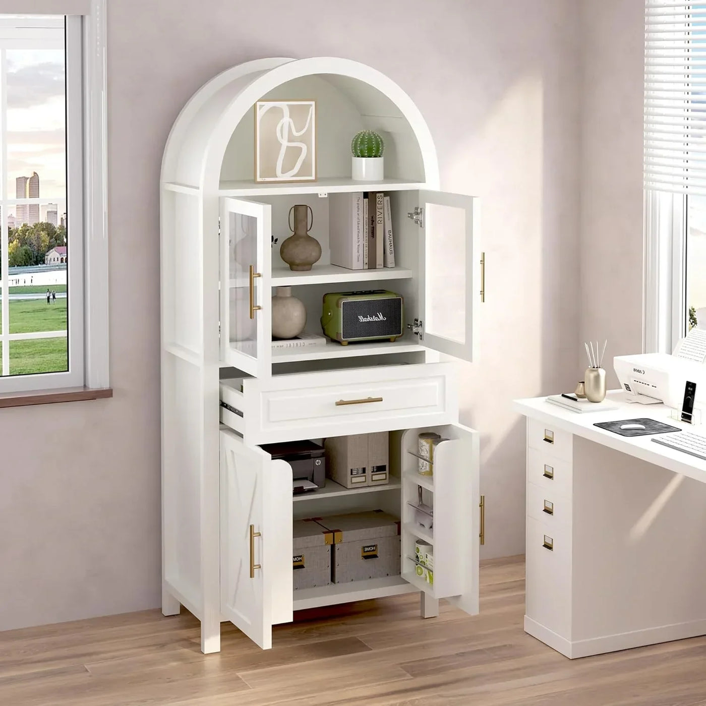 White arched storage cabinet with glass doors, shelves, and drawers for home organization