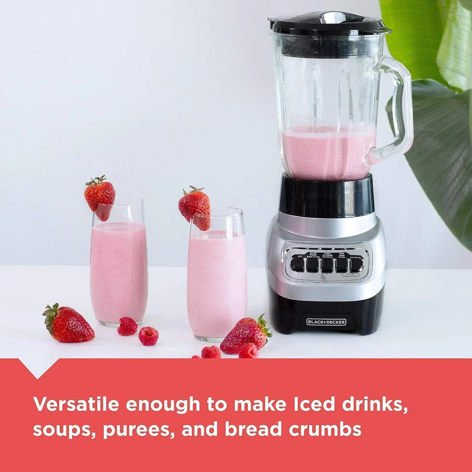 Black+Decker blender making pink smoothie with strawberries, perfect for iced drinks, soups, and purees
