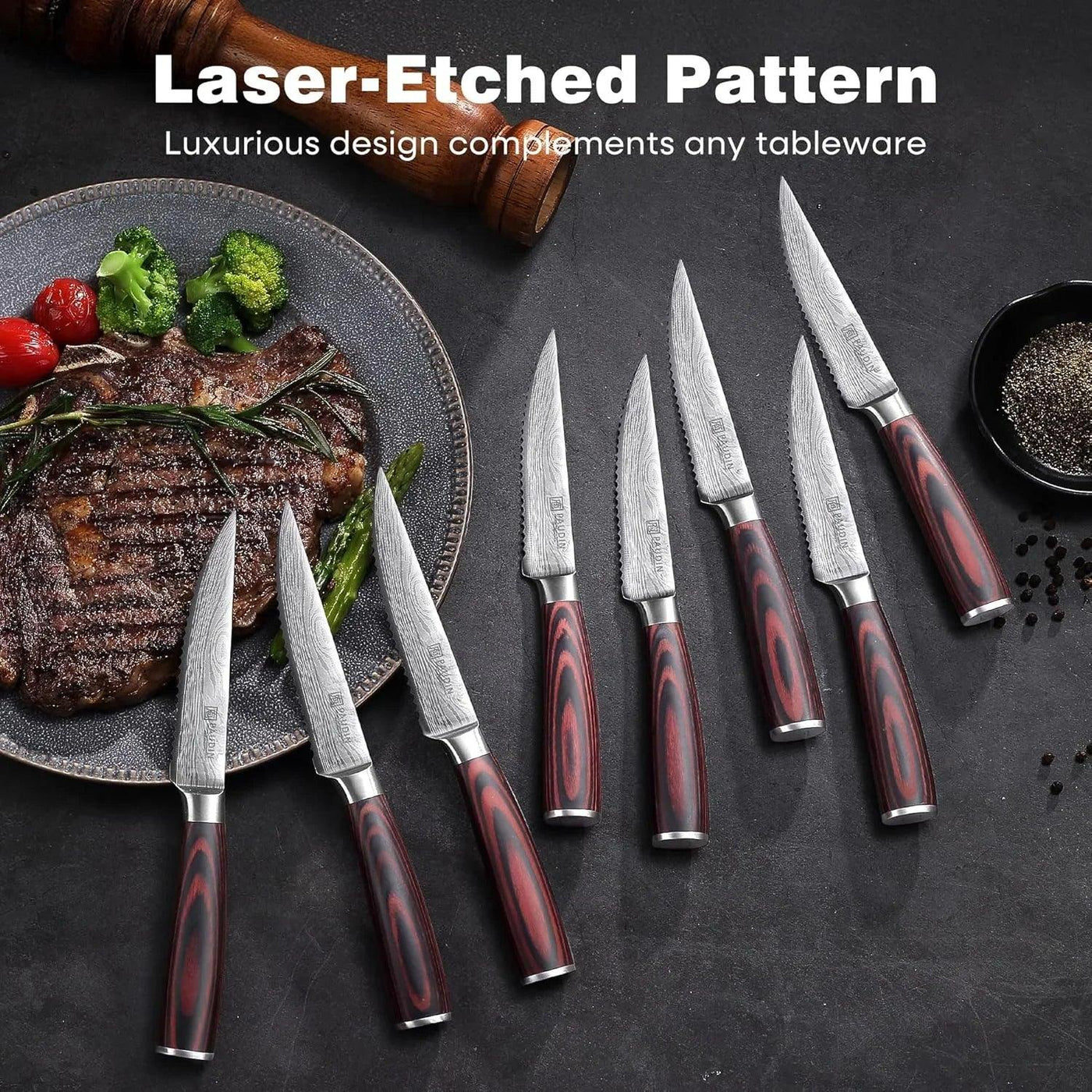 Laser-etched pattern steak knives with wood handles, served with grilled steak and veggies on dark plate