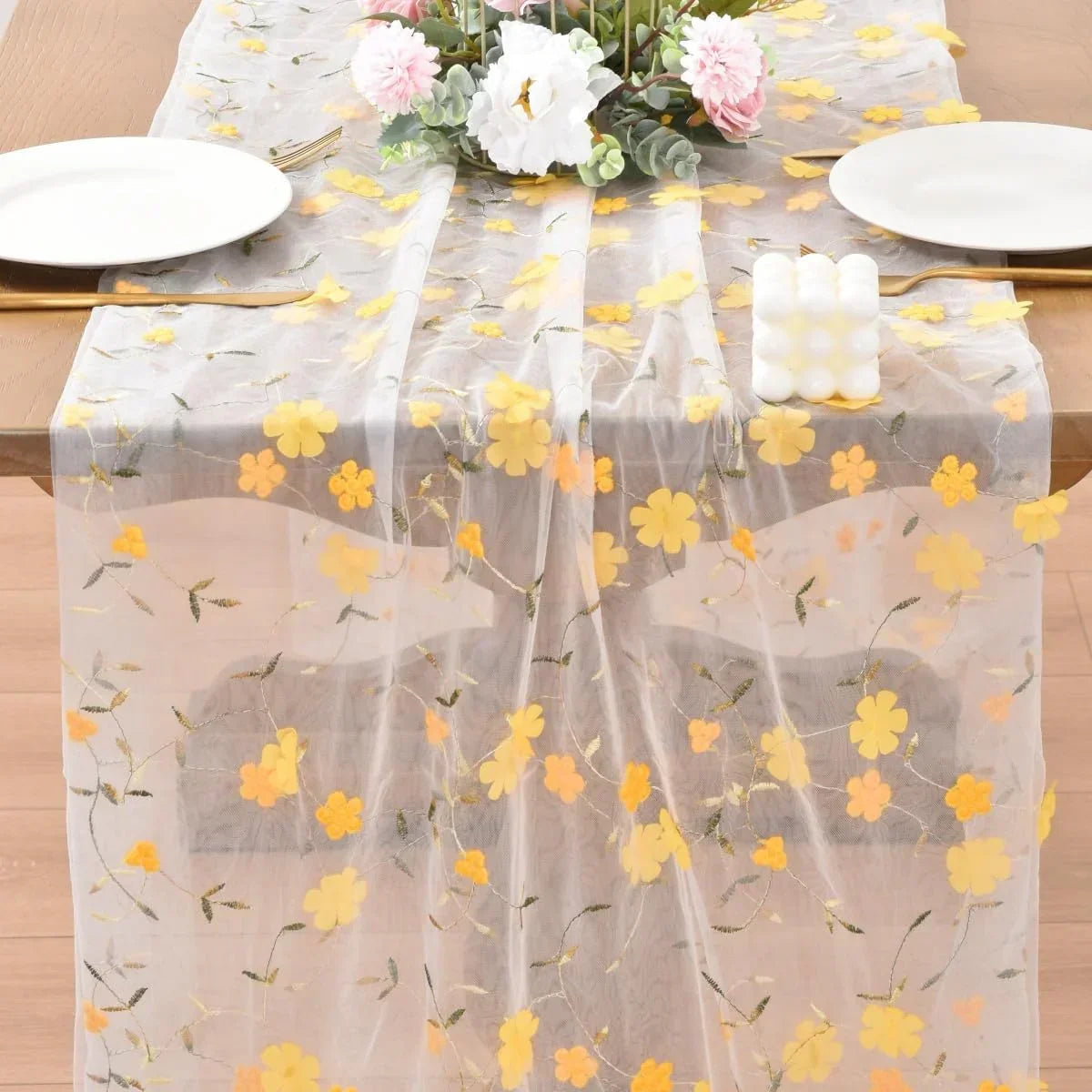 Sheer floral table runner with yellow blossoms, perfect for elegant dining table decor and kitchen table settings.
