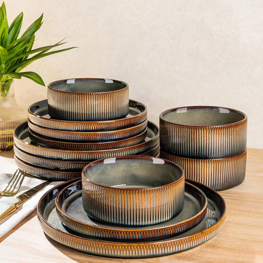 Elegant ribbed ceramic dinnerware set with earthy tones, perfect for modern kitchen dining and table settings.