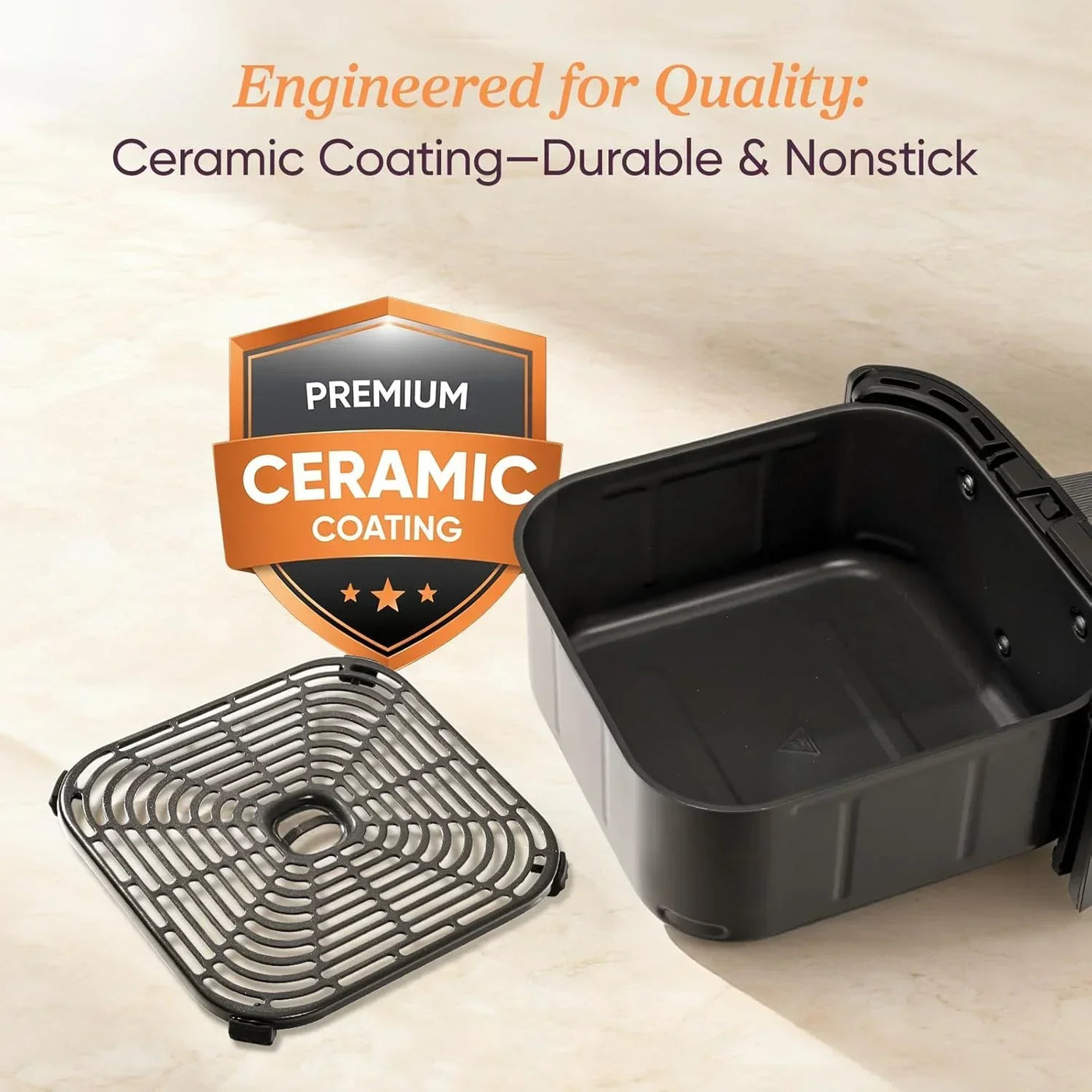 Black air fryer basket with ceramic nonstick coating and premium grilling rack for durable kitchen cooking
