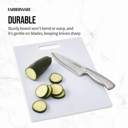 White Farberware cutting board with knife and sliced cucumber, durable kitchen prep tool