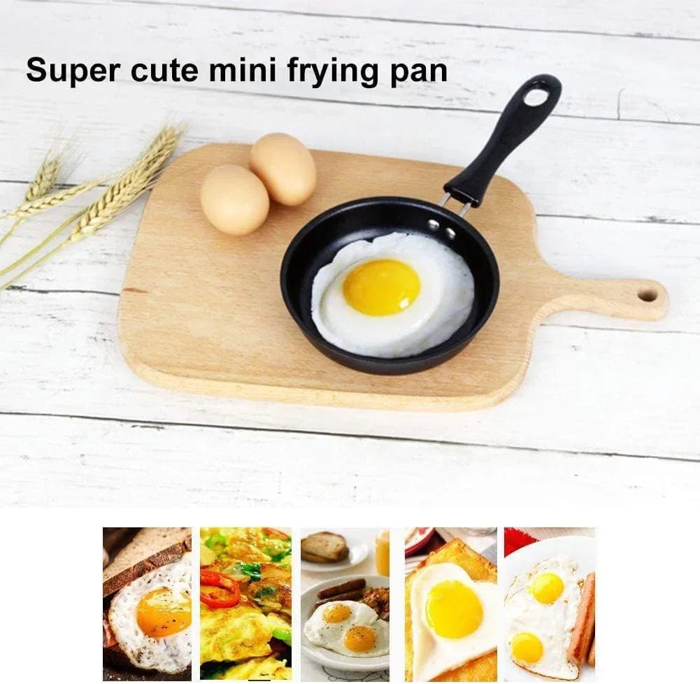 Mini frying pan with sunny-side-up egg on wooden cutting board, ideal for small kitchen tasks