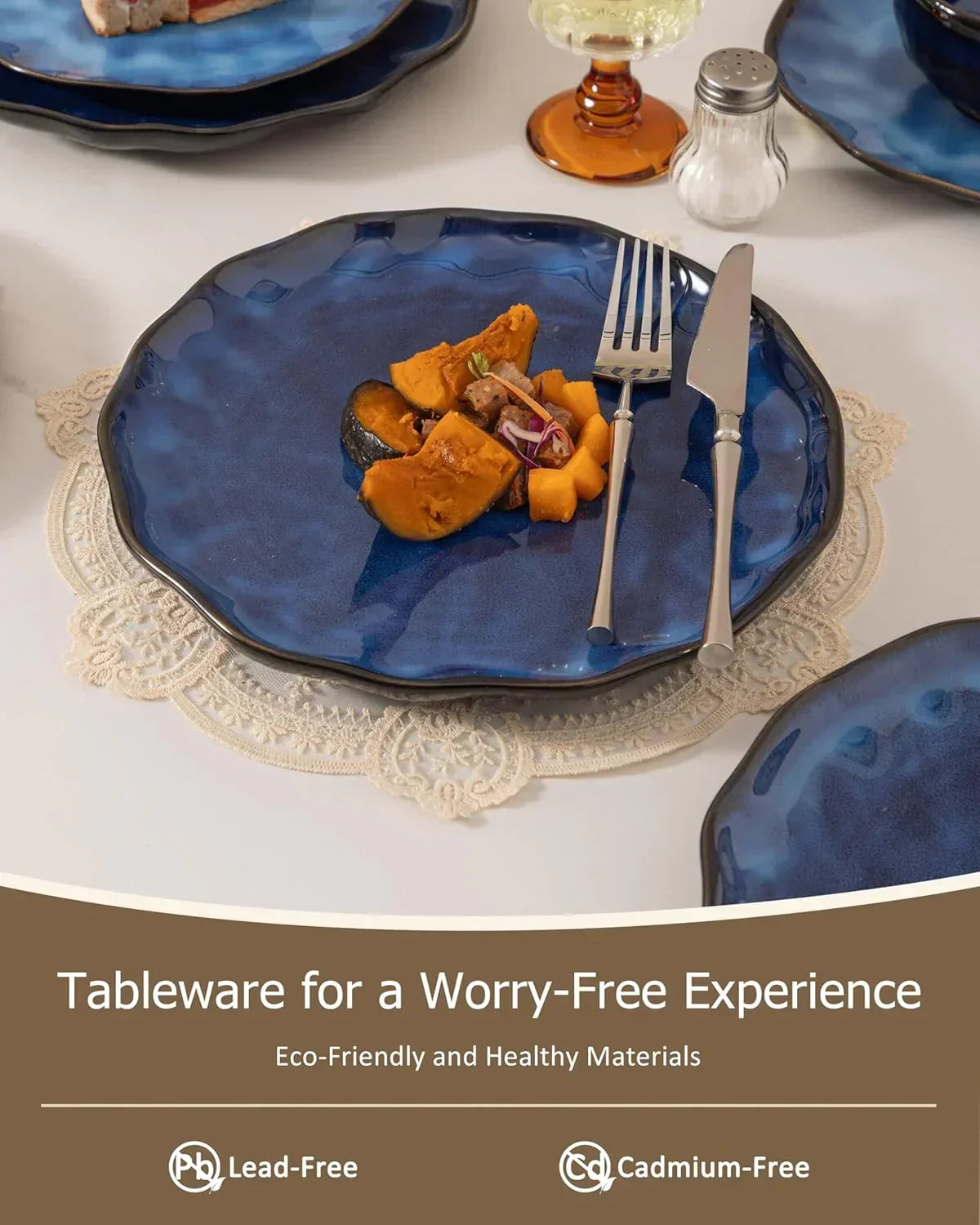 Blue ceramic plate with roasted squash, silverware, and lace doily for eco-friendly dining