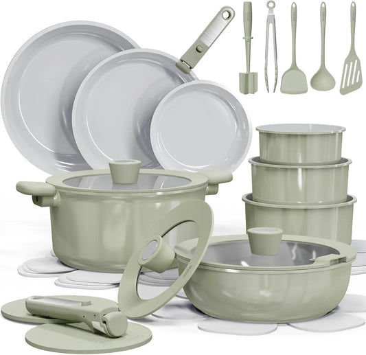 Sage green cookware and kitchen utensils set with pots, pans, storage containers, and lids