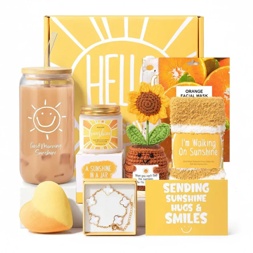 Sunshine-themed gift box with smiley sun tumbler, orange facial mask, crochet sunflower, and uplifting accessories