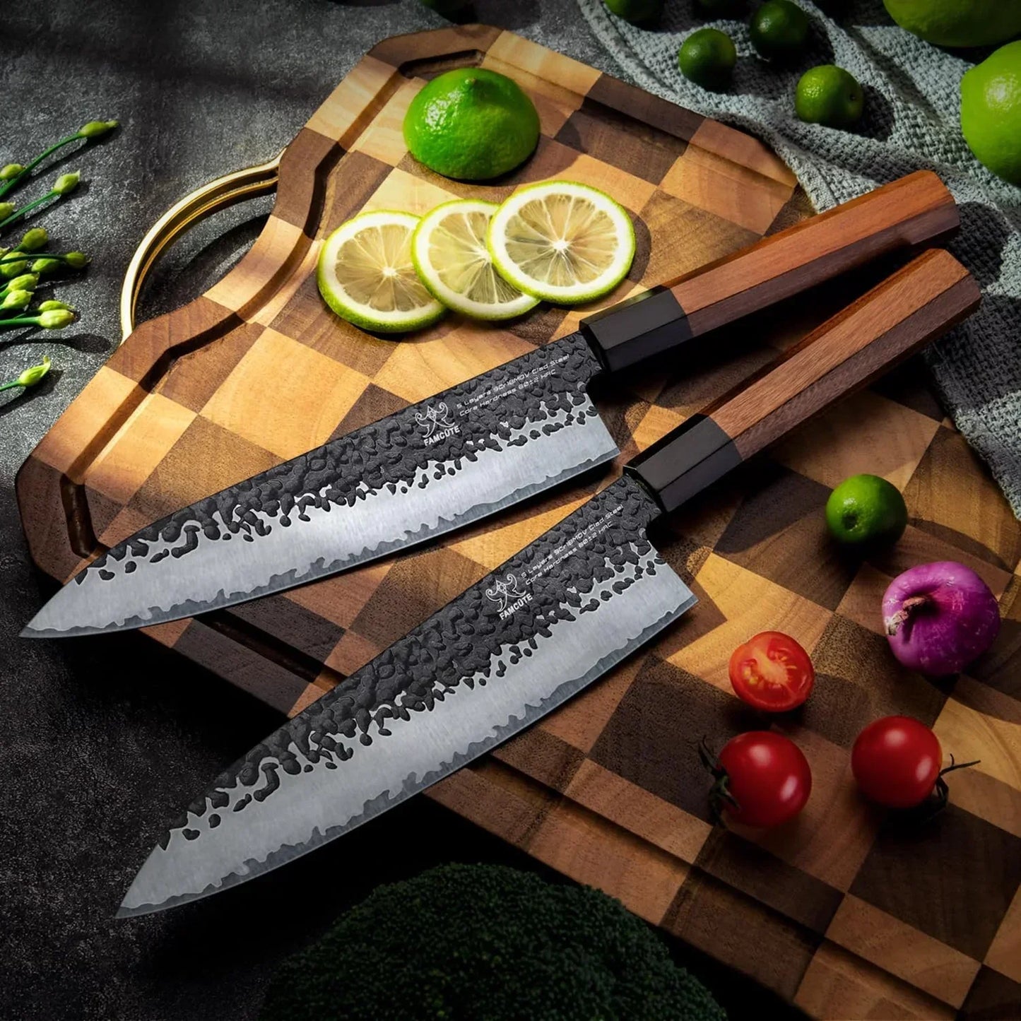 Two hammered chef knives with wooden handles on a wooden cutting board with sliced lime