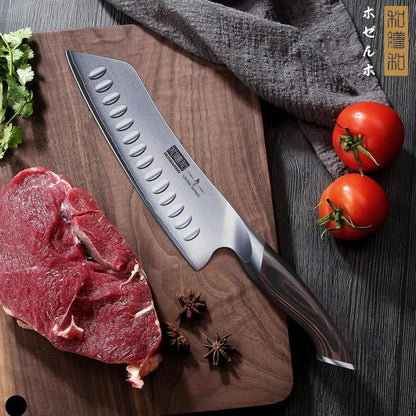 Stainless steel kitchen knife on wooden cutting board with raw beef, herbs, tomatoes, and spices