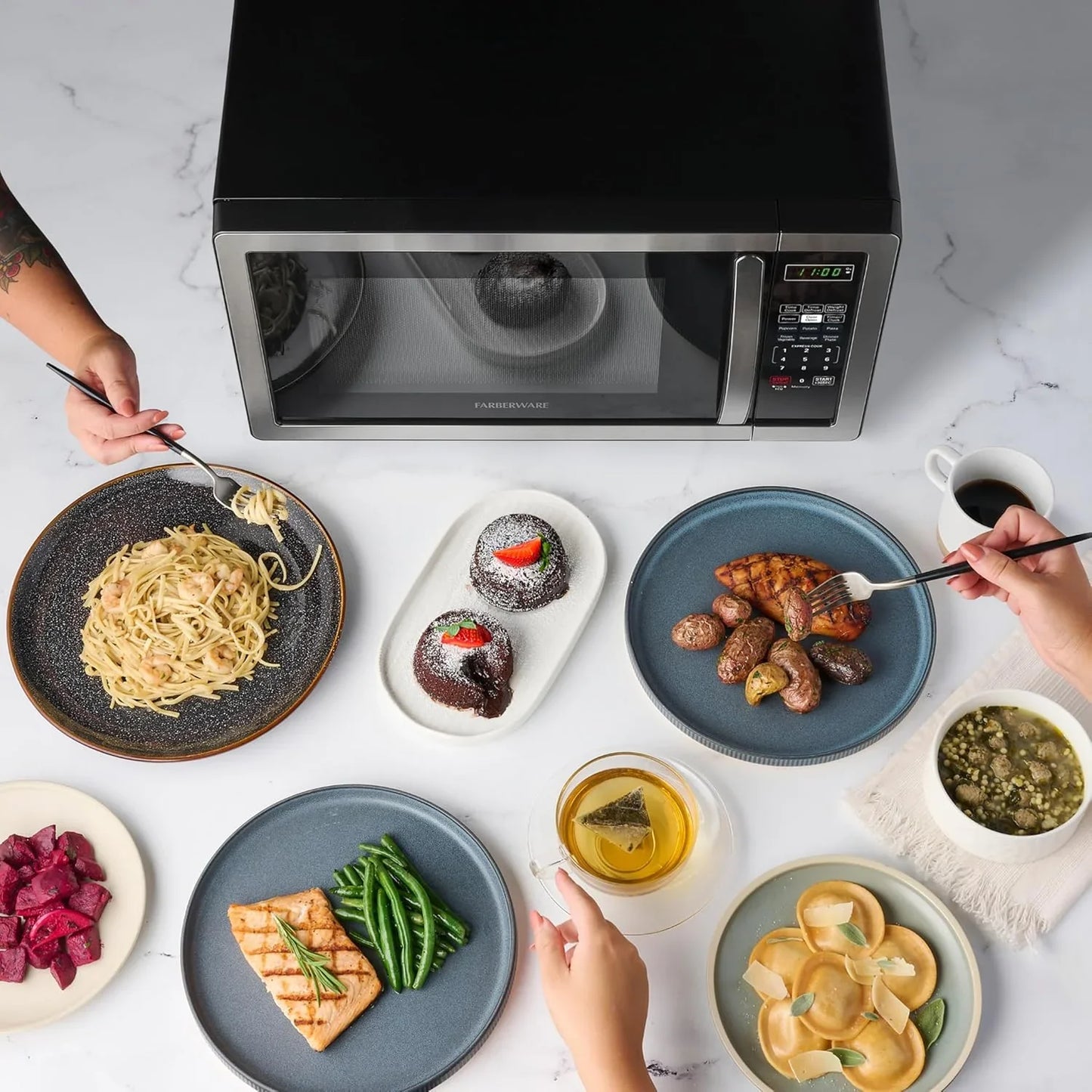 1.1 Cu. Ft. Countertop Microwave Oven – 1000 Watts Power, Auto Cook Settings, Defrost, Easy Clean and Child Safety Lock - Stainless