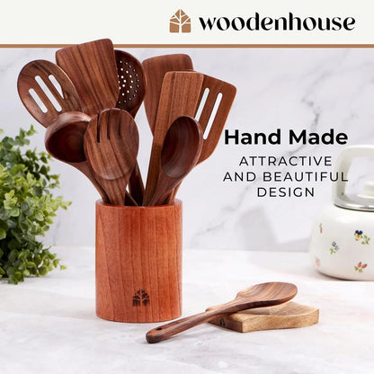 Handmade wooden kitchen utensils set in a matching holder, perfect for cooking and serving