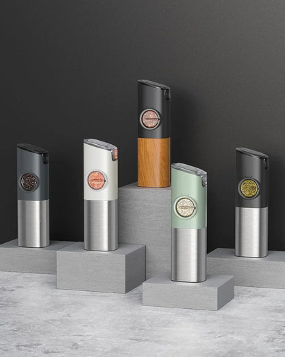 Modern electric salt and pepper grinders in stainless steel and wood, kitchen essentials for seasoning