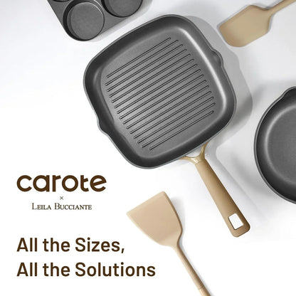 Nonstick grill pan, round skillet, muffin pan, and beige spatulas on white kitchen background.
