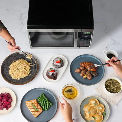 0.7 Cu. Ft. Countertop Microwave Oven – 700 Watts Power, Auto Cook Settings, Defrost, Easy Clean and Child Safety Lock - Stainless