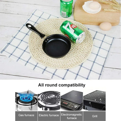 Non-stick frying pan on woven mat with 7UP can, compatible with gas, electric, induction, and grill cooktops