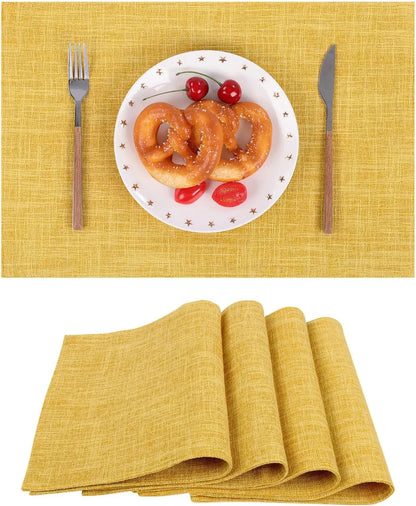 Yellow textured placemats with pretzels, cherries, and tableware for stylish kitchen dining setup