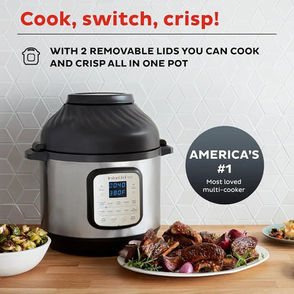 Instant Pot multi-cooker with air fry lid, cooking ribs and Brussels sprouts on kitchen counter