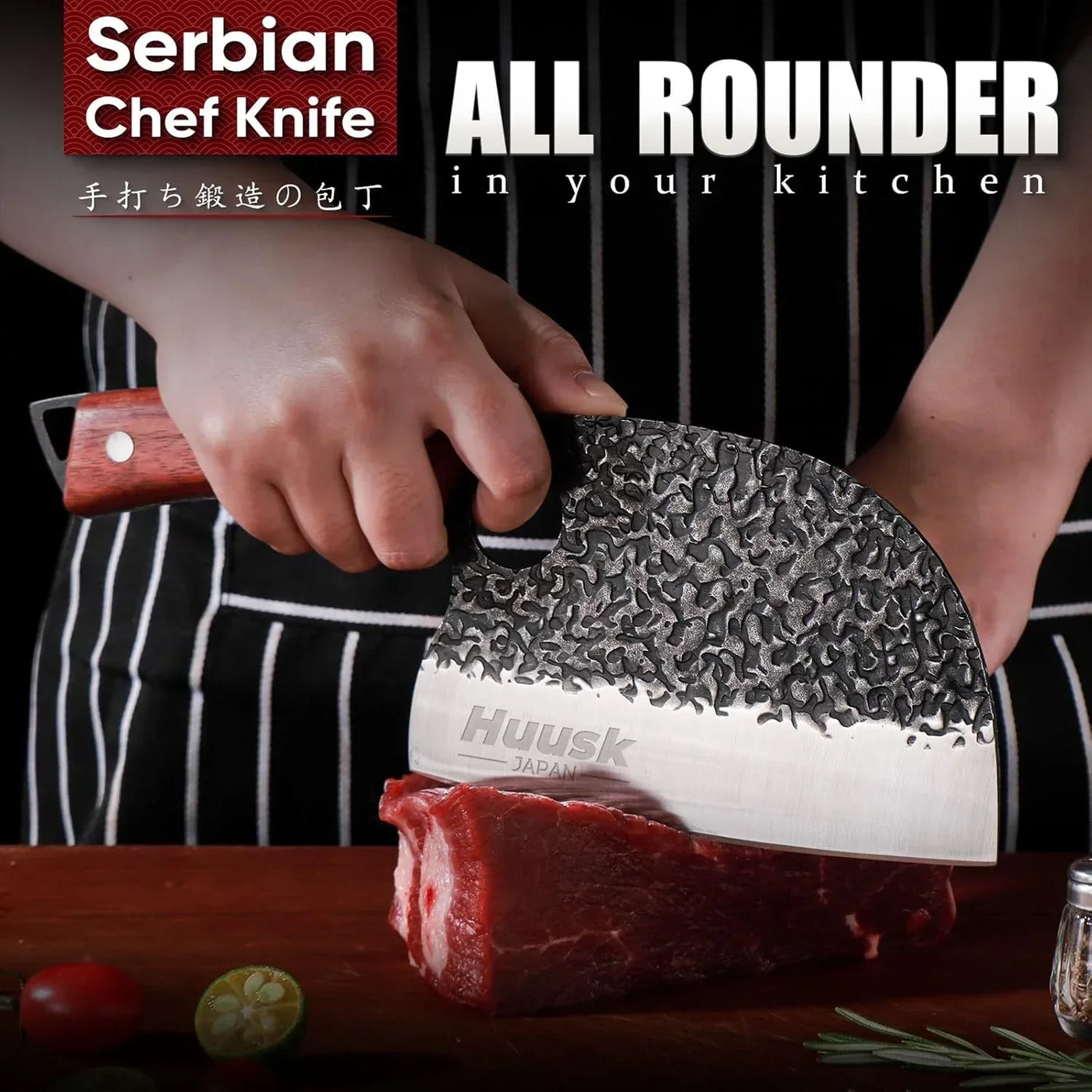 Hand holding a Serbian chef knife slicing raw meat on a wooden cutting board with kitchen tools.