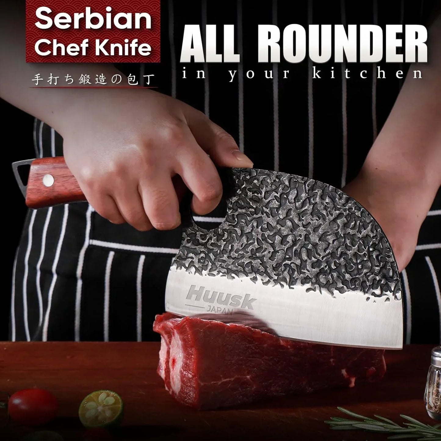 Hand holding a Serbian chef knife slicing raw meat on a wooden cutting board with kitchen tools.