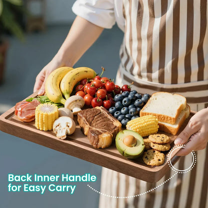 Wooden serving tray with inner handle, holding fresh food like bananas, steak, corn, and berries for easy kitchen carry.