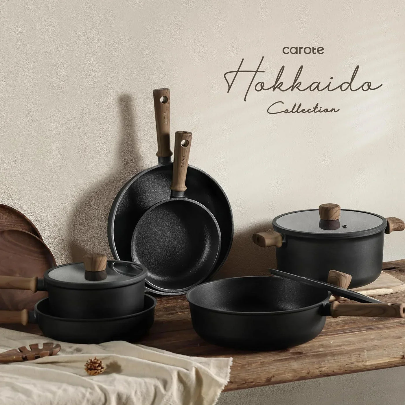 Carote Hokkaido Collection black cookware set with wooden handles, nonstick pots and pans for modern kitchens