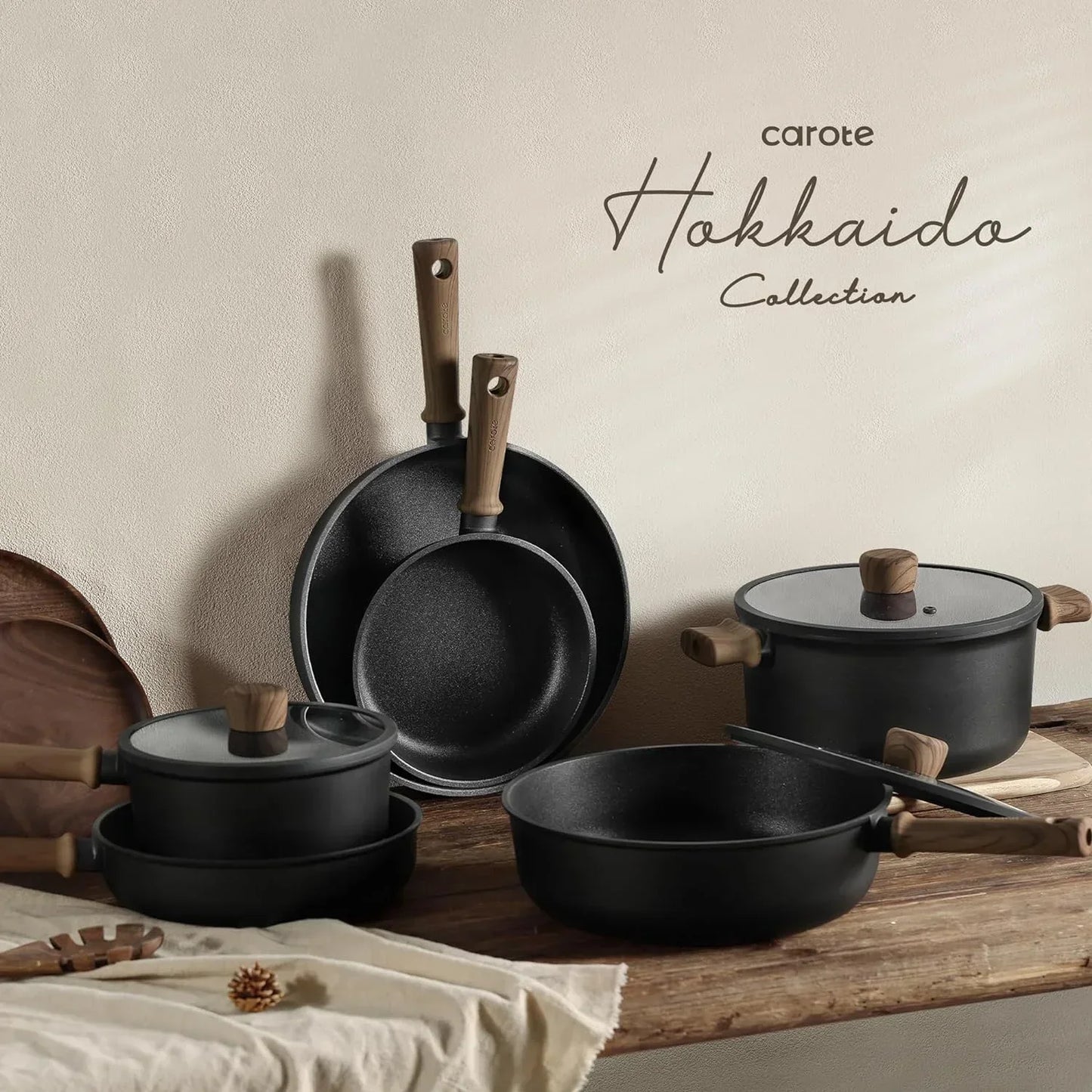 Carote Hokkaido Collection black cookware set with wooden handles, nonstick pots and pans for modern kitchens