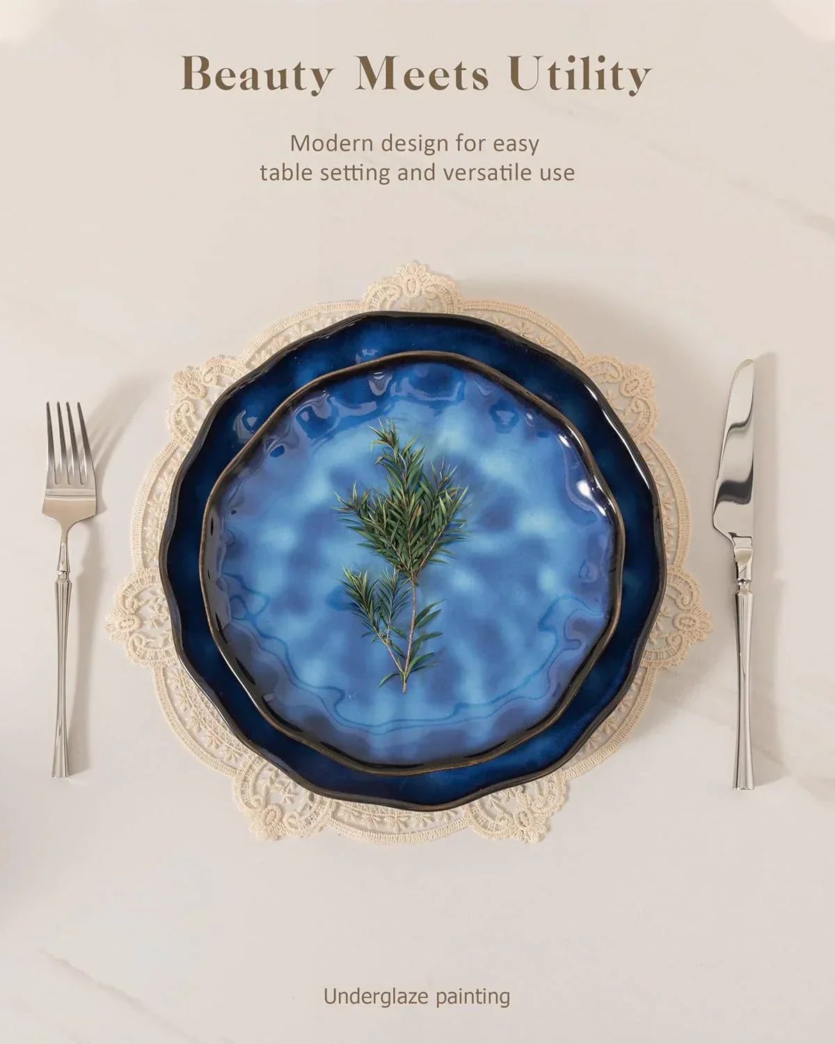 Blue ceramic plates with underglaze painting, lace placemat, and silverware for elegant table setting