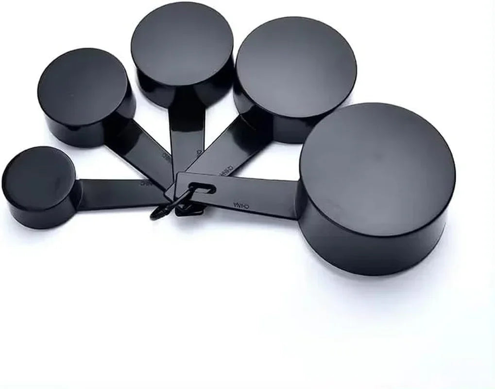 Black measuring cups set for baking and cooking, kitchen tools for precise ingredient measurement