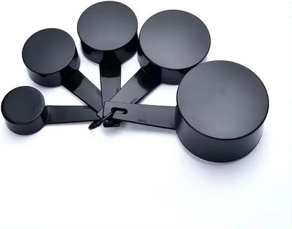 Black measuring cups set for baking and cooking, kitchen tools for precise ingredient measurement