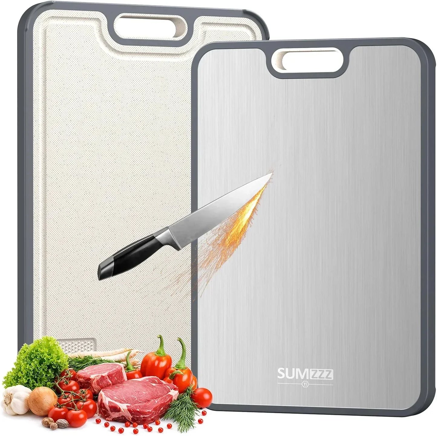 Stainless steel and beige cutting boards with knife, fresh veggies, and meat for kitchen prep