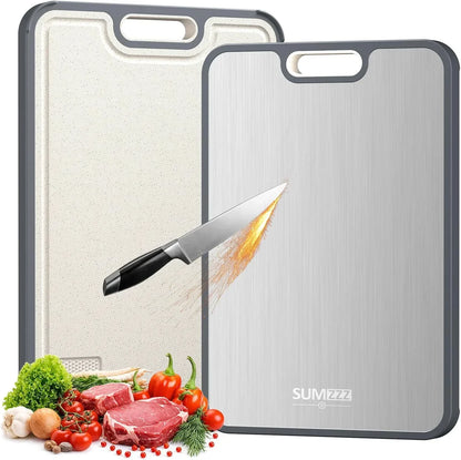 Stainless steel and beige cutting boards with knife, fresh veggies, and meat for kitchen prep