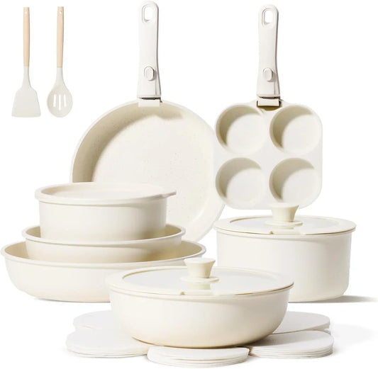 Cream-colored cookware set with pots, pans, lids, and utensils for everyday kitchen use