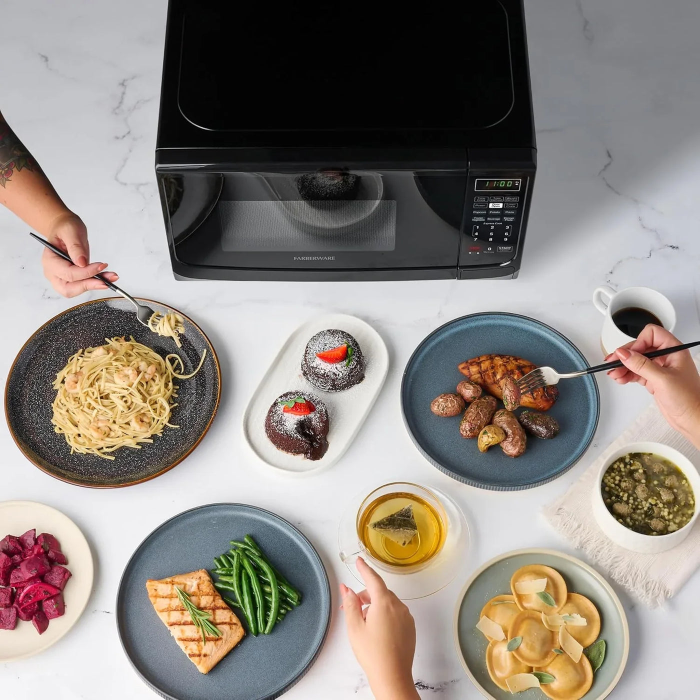 0.7 Cu. Ft. Countertop Microwave Oven – 700 Watts Power, Auto Cook Settings, Defrost, Easy Clean and Child Safety Lock - Black