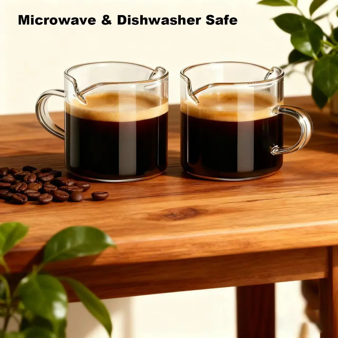 Microwave & dishwasher safe glass coffee mugs with handles, filled with black coffee on wooden table