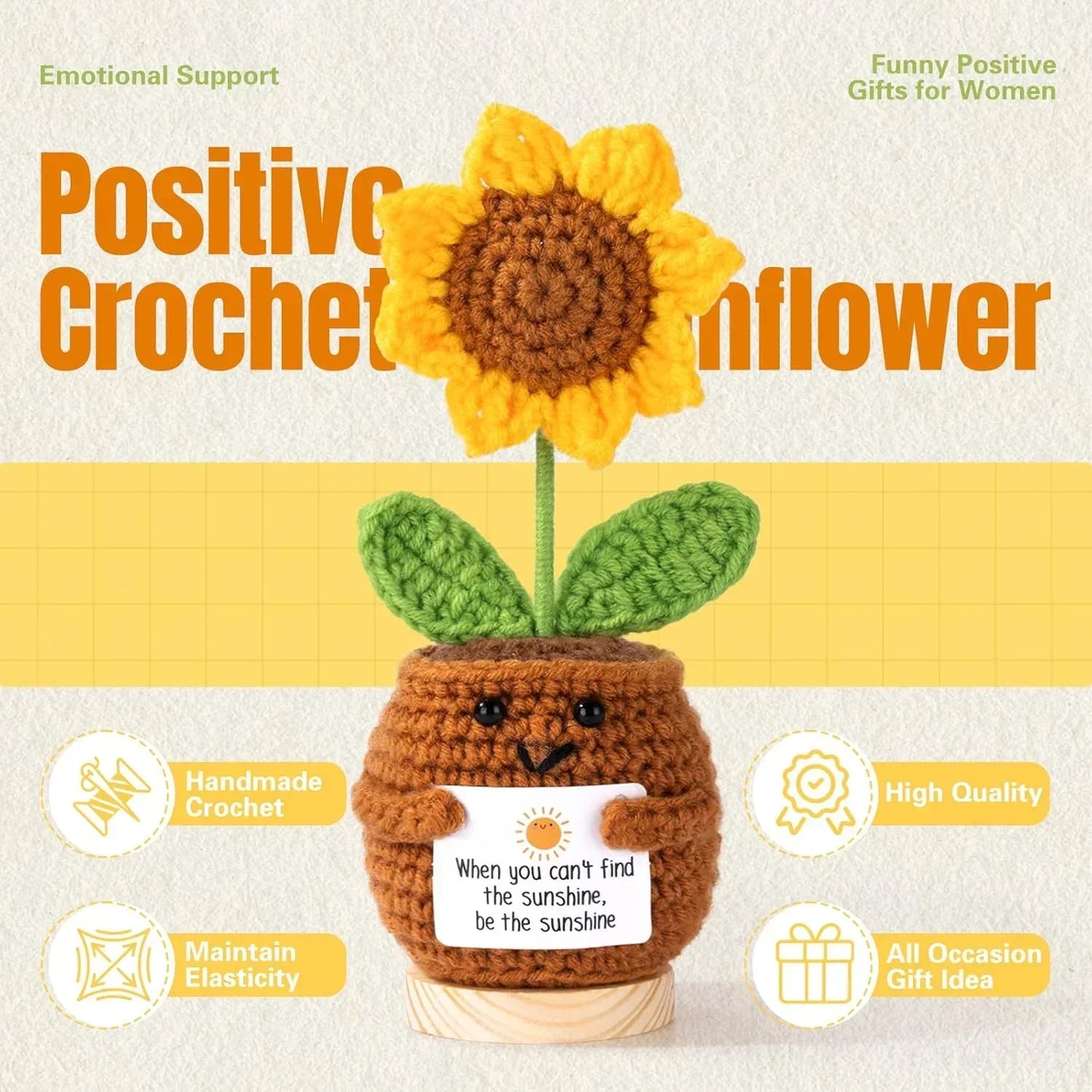 Handmade crochet sunflower in pot with smiley face, holding motivational quote card, positive gift idea