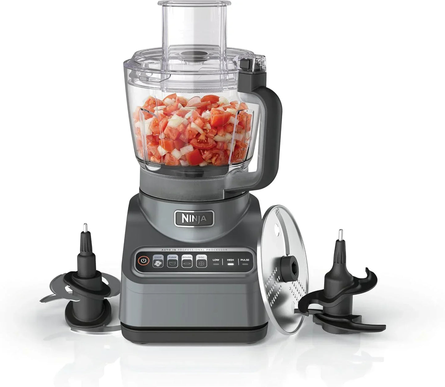 Ninja food processor with chopped tomatoes and onions, featuring multiple blades and auto IQ settings for easy meal prep.