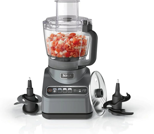 Ninja food processor with chopped tomatoes and onions, featuring multiple blades and auto IQ settings for easy meal prep.
