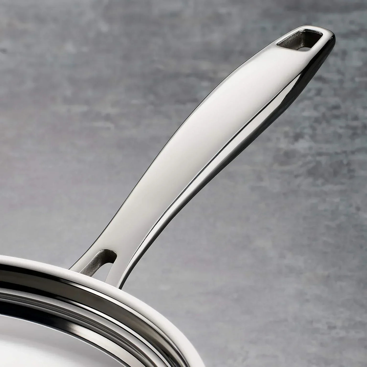 Stainless steel cookware handle with sleek, modern design for everyday kitchen use